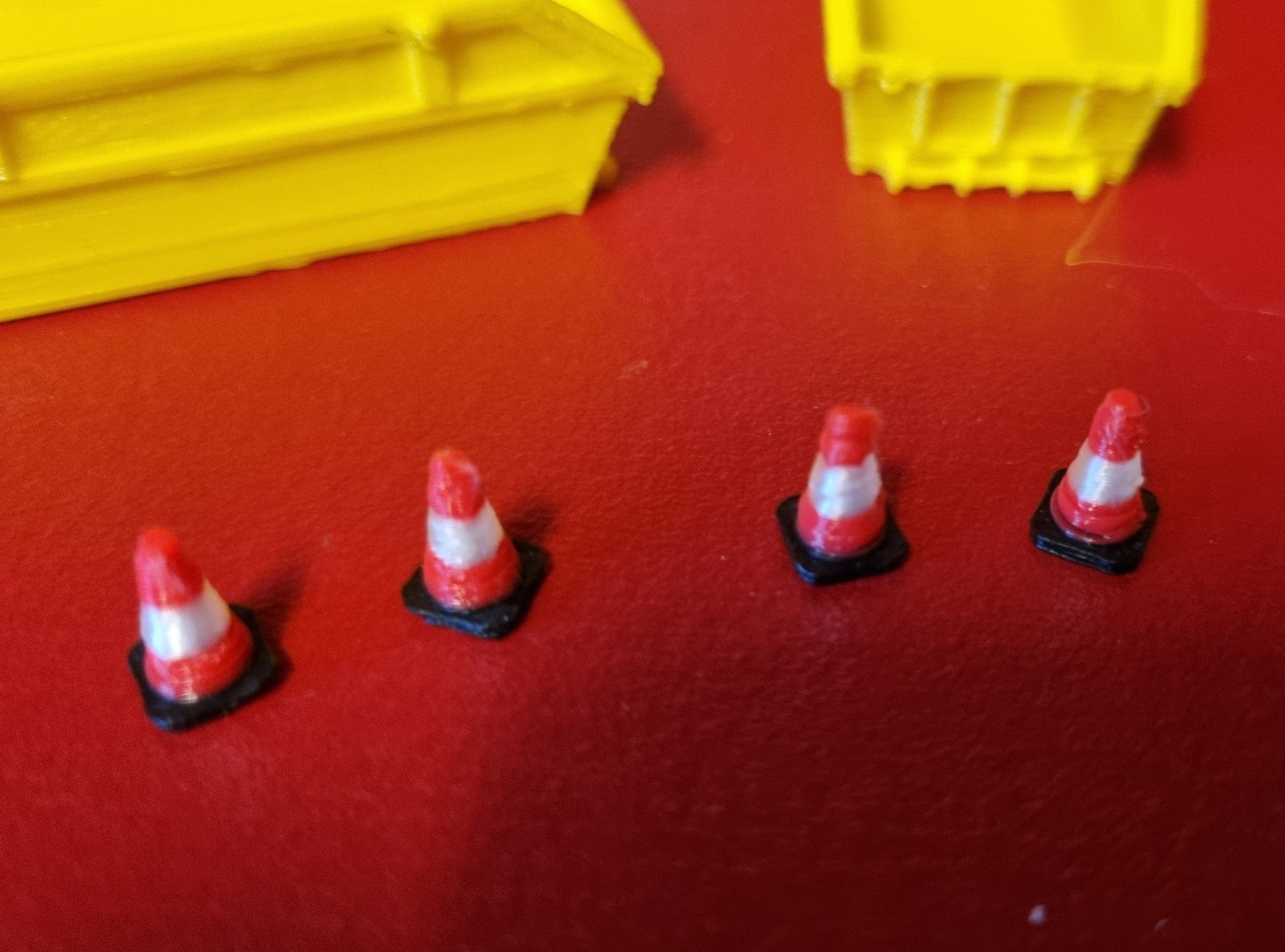 00 gauge 3 x 8 yd skip with 6 road cones 3D printed in Yellow