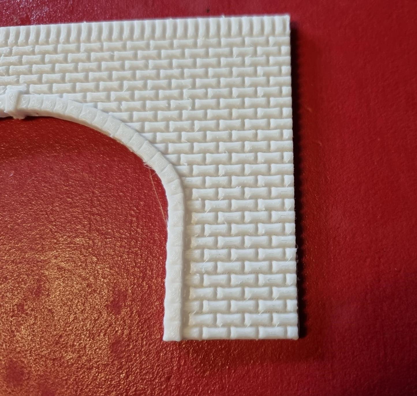 TT gauge Double track tunnel portal 3D printed with brick detail.