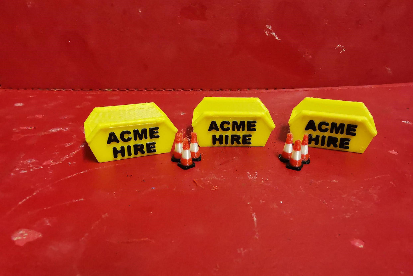 00 gauge 3 x 6 yd skip ACME HIRE branded with 6 road cones