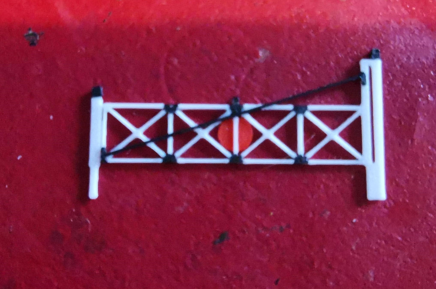 Z GAUGE LEVEL CROSSING GATE 3D PRINTED IN BLACK AND WHITE HAND PAINTED DETAIL.