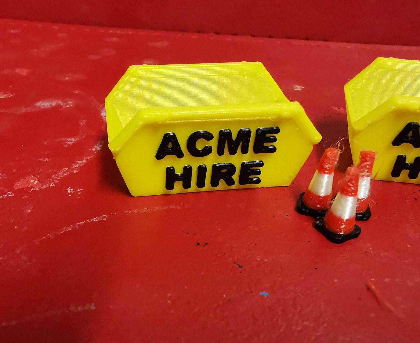 00 gauge 3 x 6 yd skip ACME HIRE branded with 6 road cones