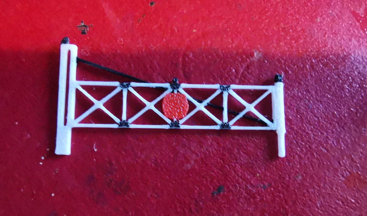 Z GAUGE LEVEL CROSSING GATE 3D PRINTED IN BLACK AND WHITE HAND PAINTED DETAIL.