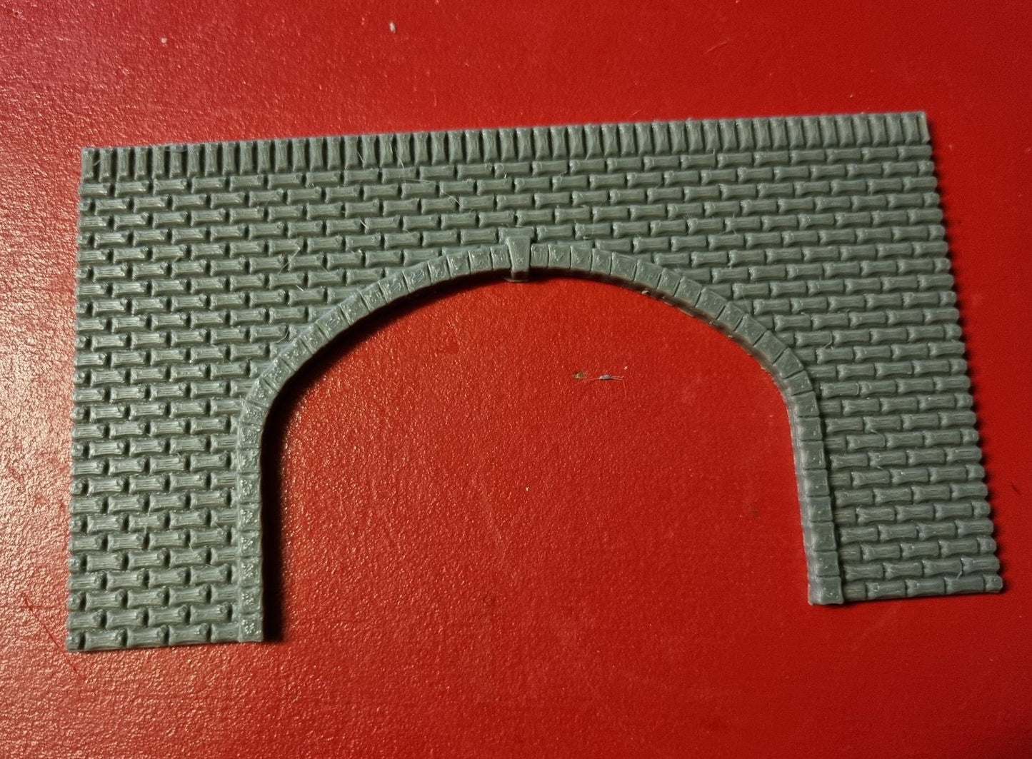 TT gauge Double track tunnel portal 3D printed with brick detail.