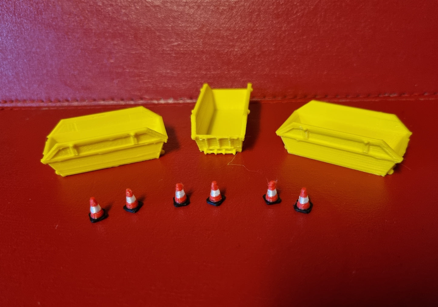 00 gauge 3 x 8 yd skip with 6 road cones 3D printed in Yellow