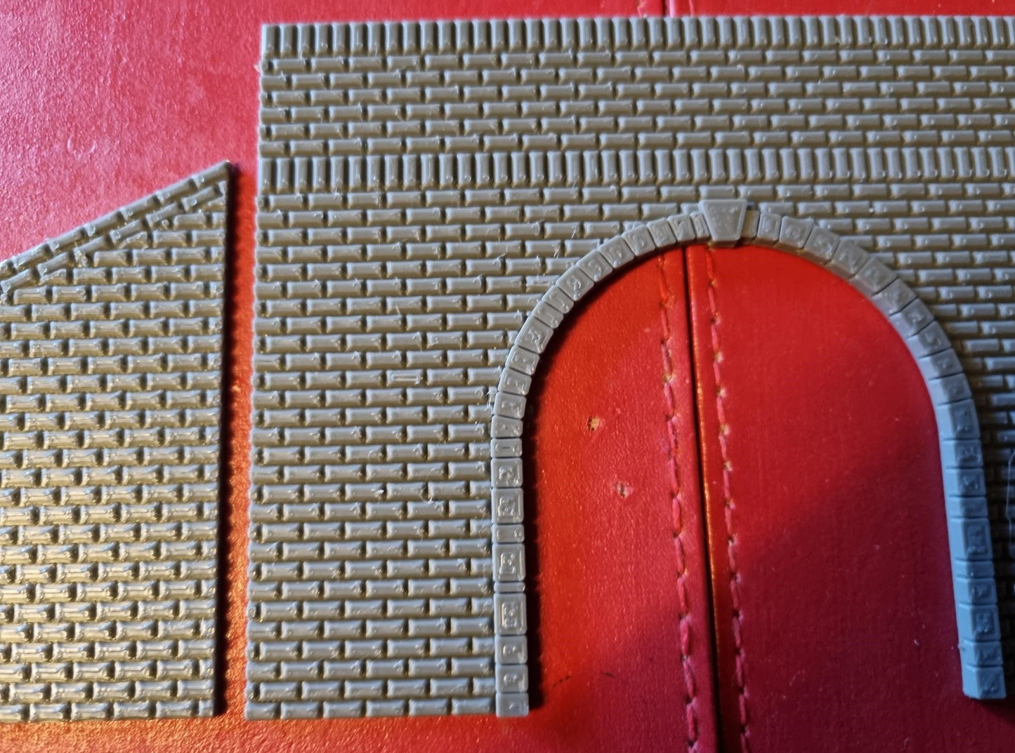 00 gauge Single track tunnel portal 3D printed with brick detail.