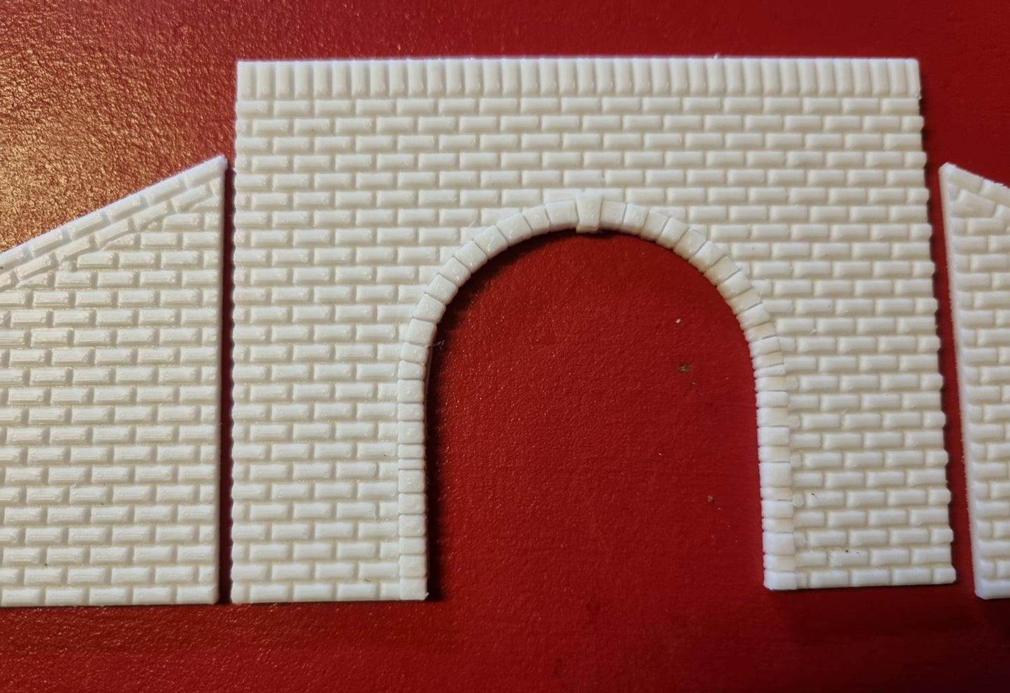 TT gauge Double track tunnel portal 3D printed with brick detail.