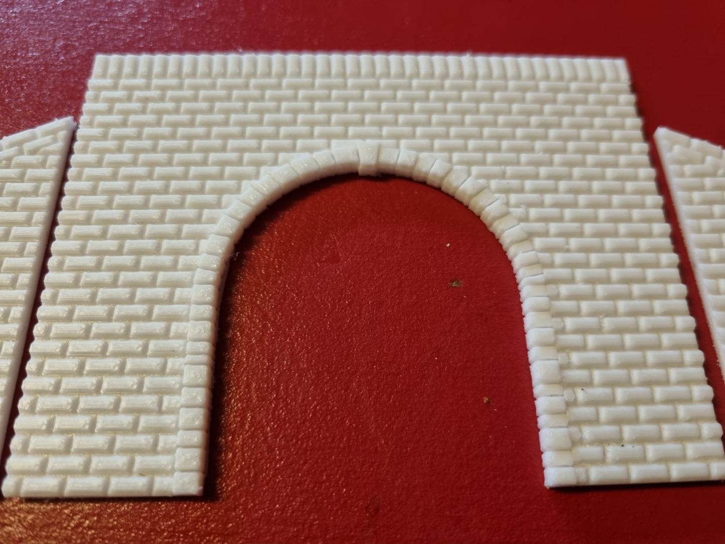 TT gauge Double track tunnel portal 3D printed with brick detail.